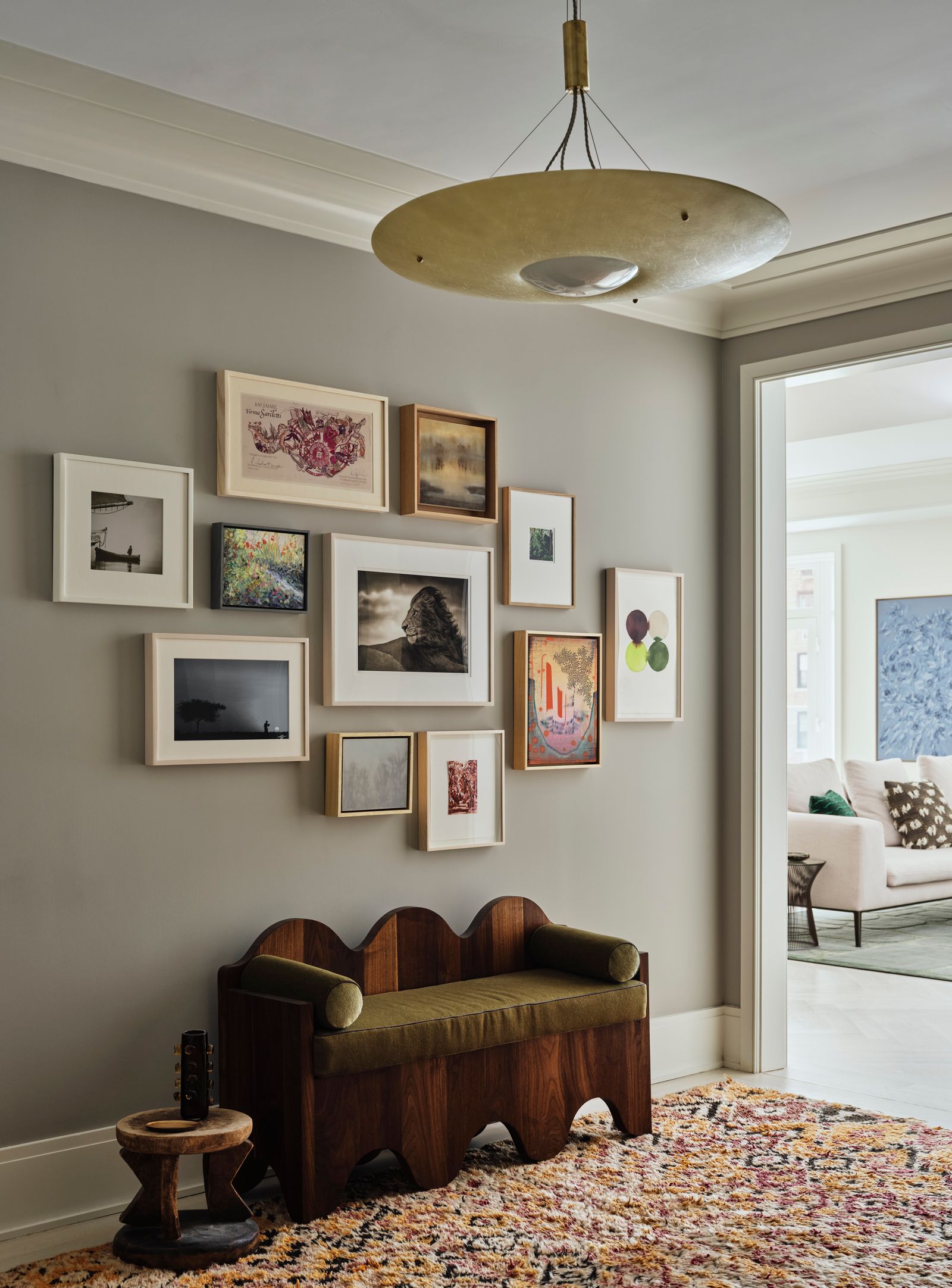 Image may contain Corner Home Decor Indoors Interior Design Chandelier Lamp Art Painting Furniture and Person