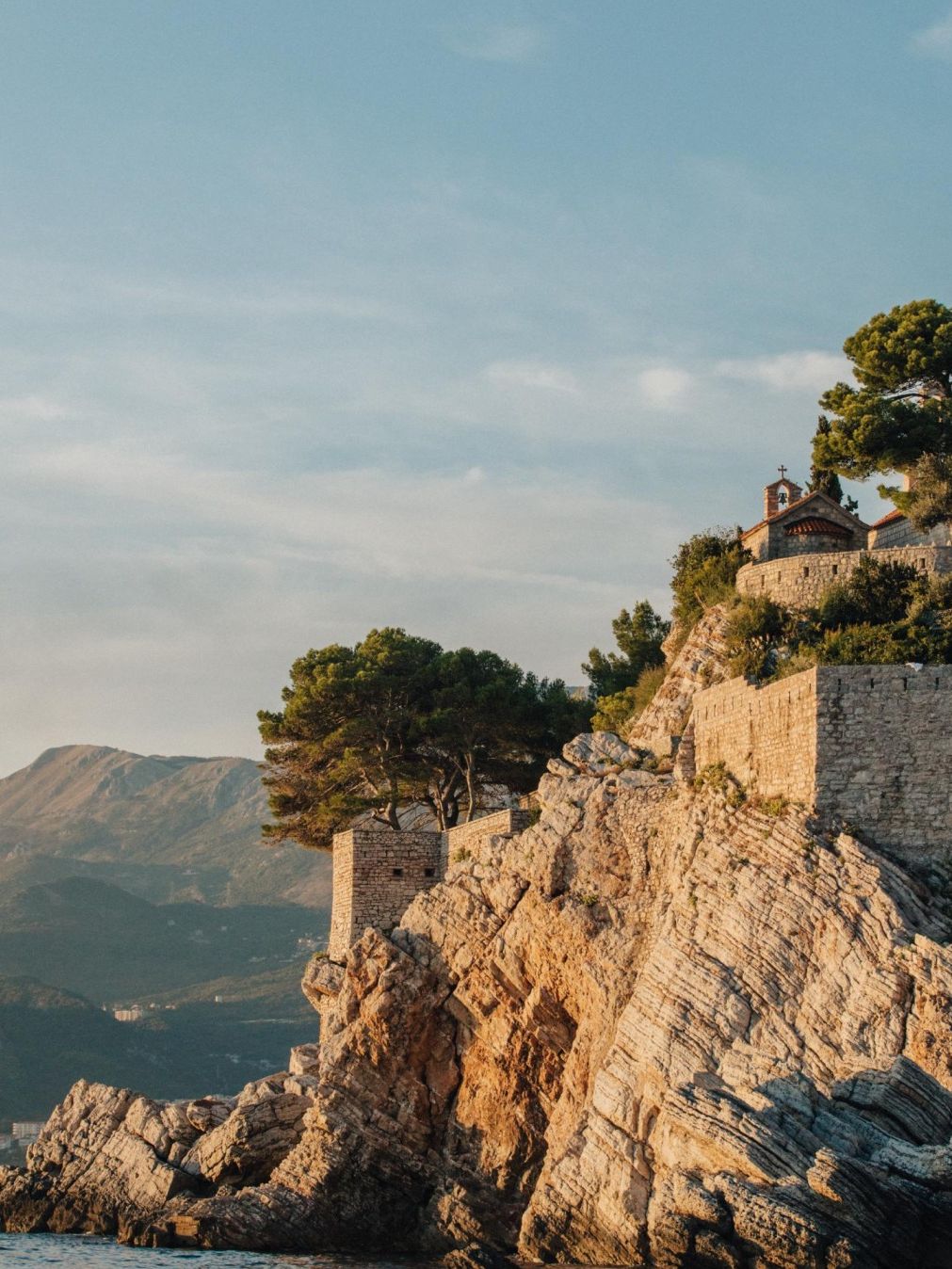 Image may contain Cliff Nature Outdoors Rock Architecture Building Castle Fortress and Scenery