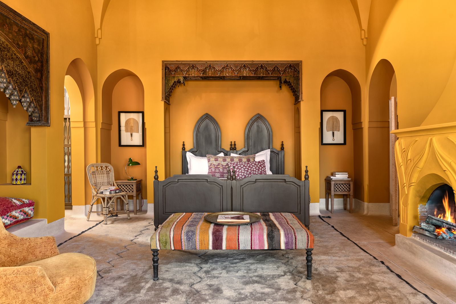 Image may contain Home Decor Chair Furniture Bed Art Painting Floor Architecture Building Indoors and Living Room