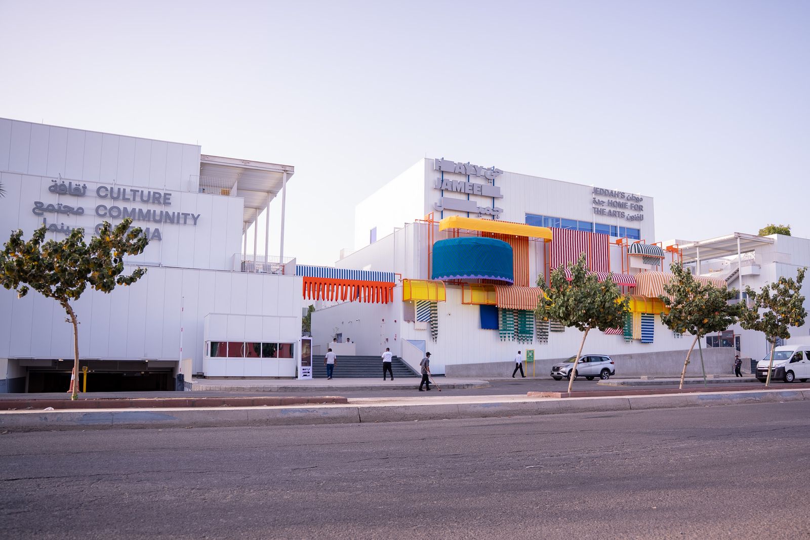 Image may contain Shop Shopping Mall Person Walking City Car Transportation Vehicle Road Street and Urban