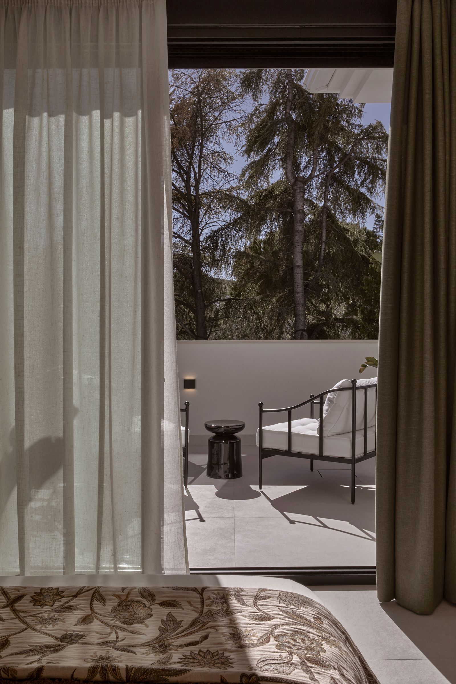 Image may contain Bed Furniture Architecture Balcony Building and Window