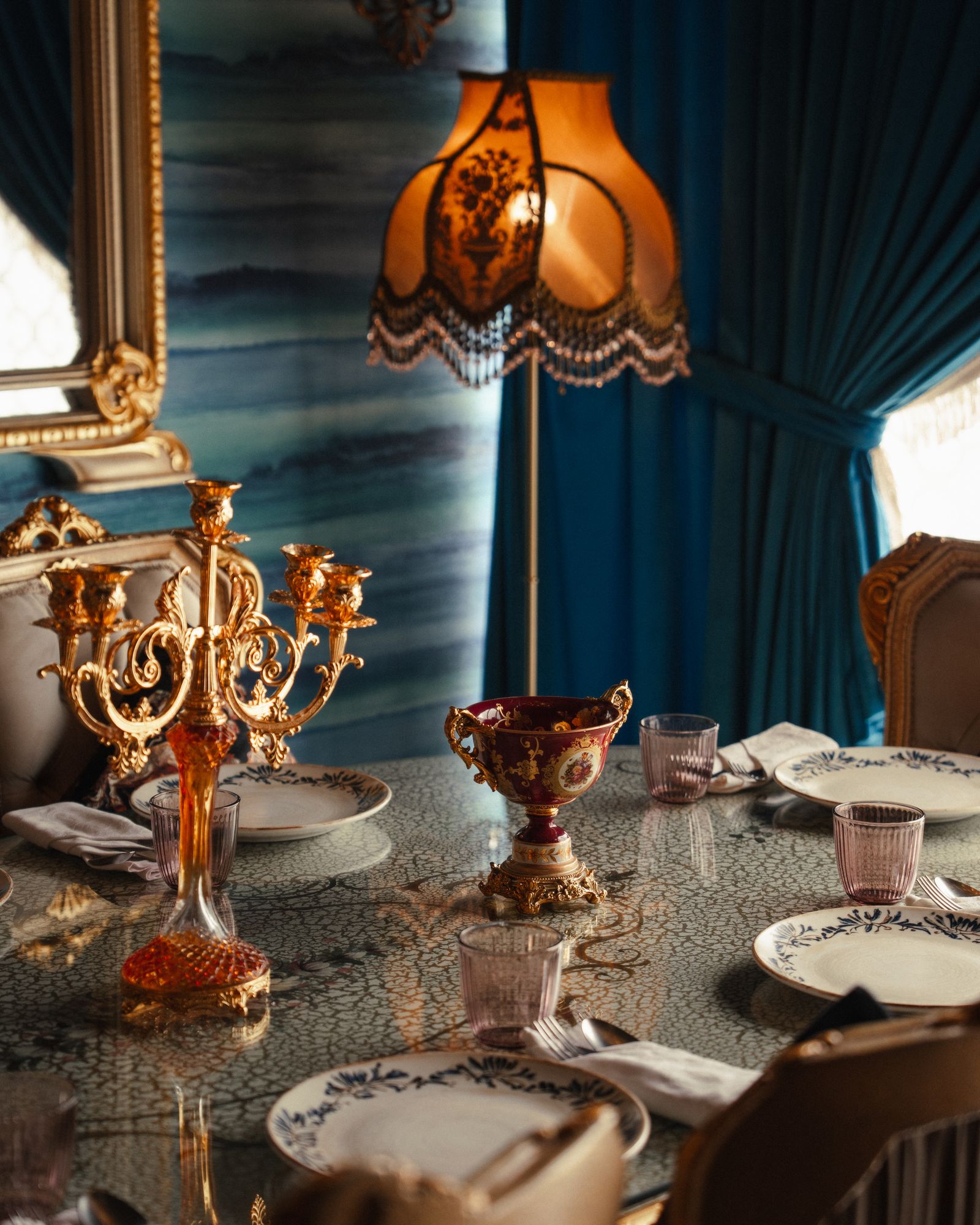 Image may contain Architecture Building Dining Room Dining Table Furniture Indoors Room Table Tabletop and Lamp