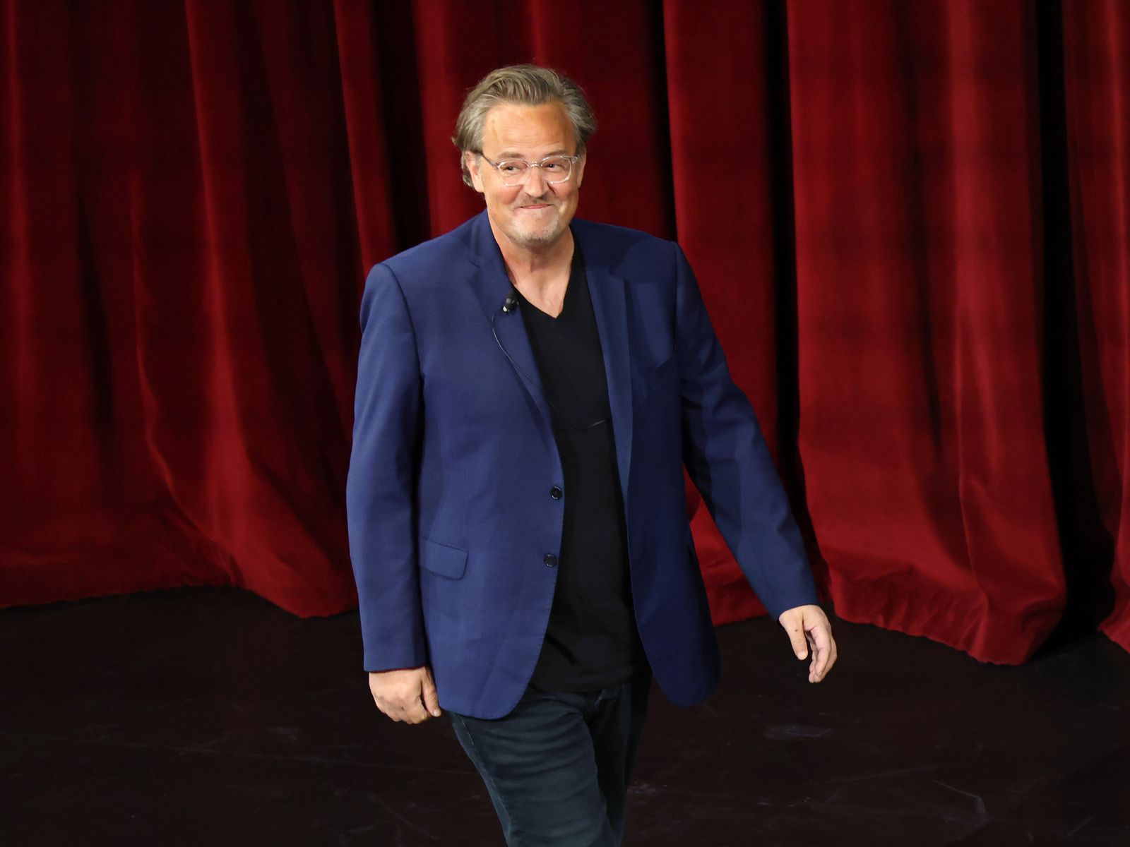 Image may contain Matthew Perry Performer Person Solo Performance Adult Blazer Clothing Coat Jacket Face and Head