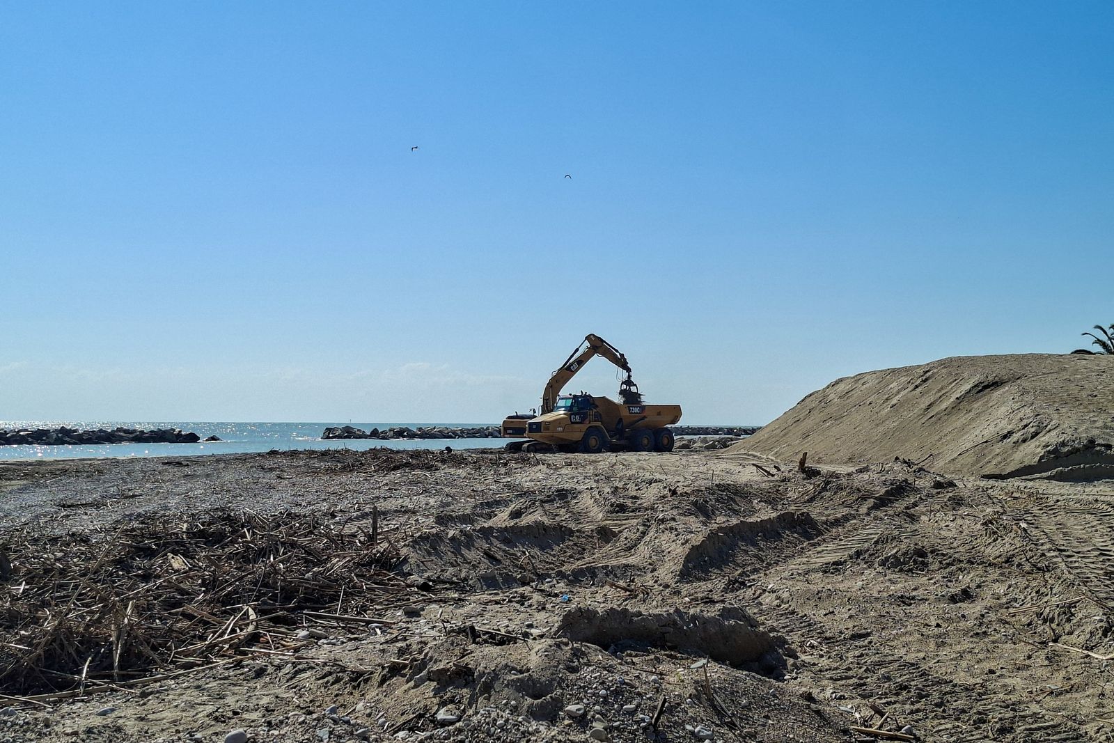 Image may contain Machine Nature Outdoors Sky and Bulldozer