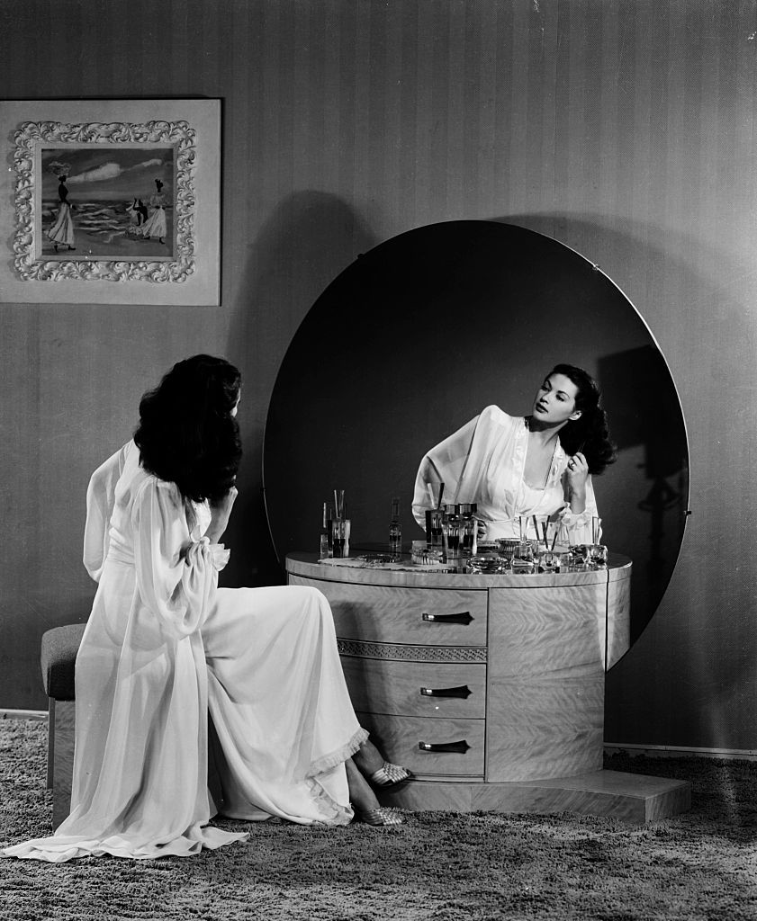 Image may contain Yvonne De Carlo Adult Person Sitting Face and Head