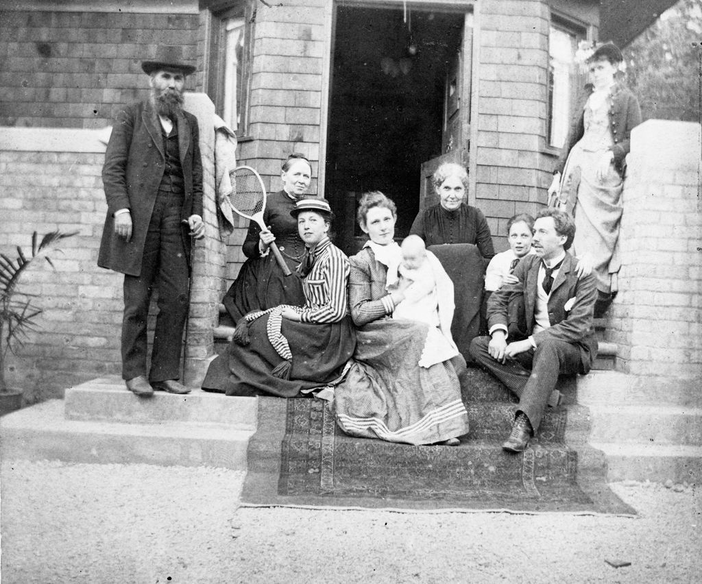 Wright and Lloyd Jones families on Home porch