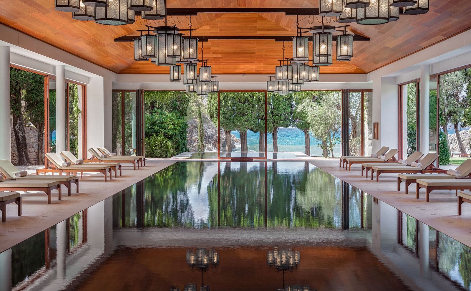 Image may contain Indoors Interior Design Floor Nature Outdoors Scenery Pool Water Swimming Pool and Architecture