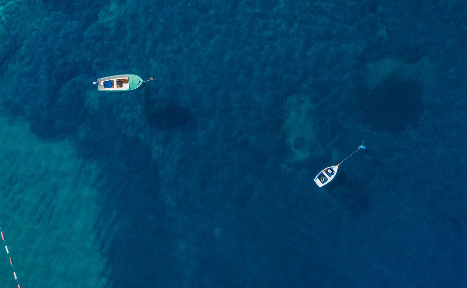 Image may contain Nature Outdoors Sea Water Land Coast Shoreline Boat Transportation and Vehicle