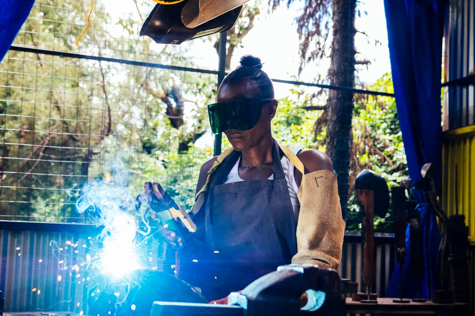 Image may contain Adult Person Metalworking Worker and Welding