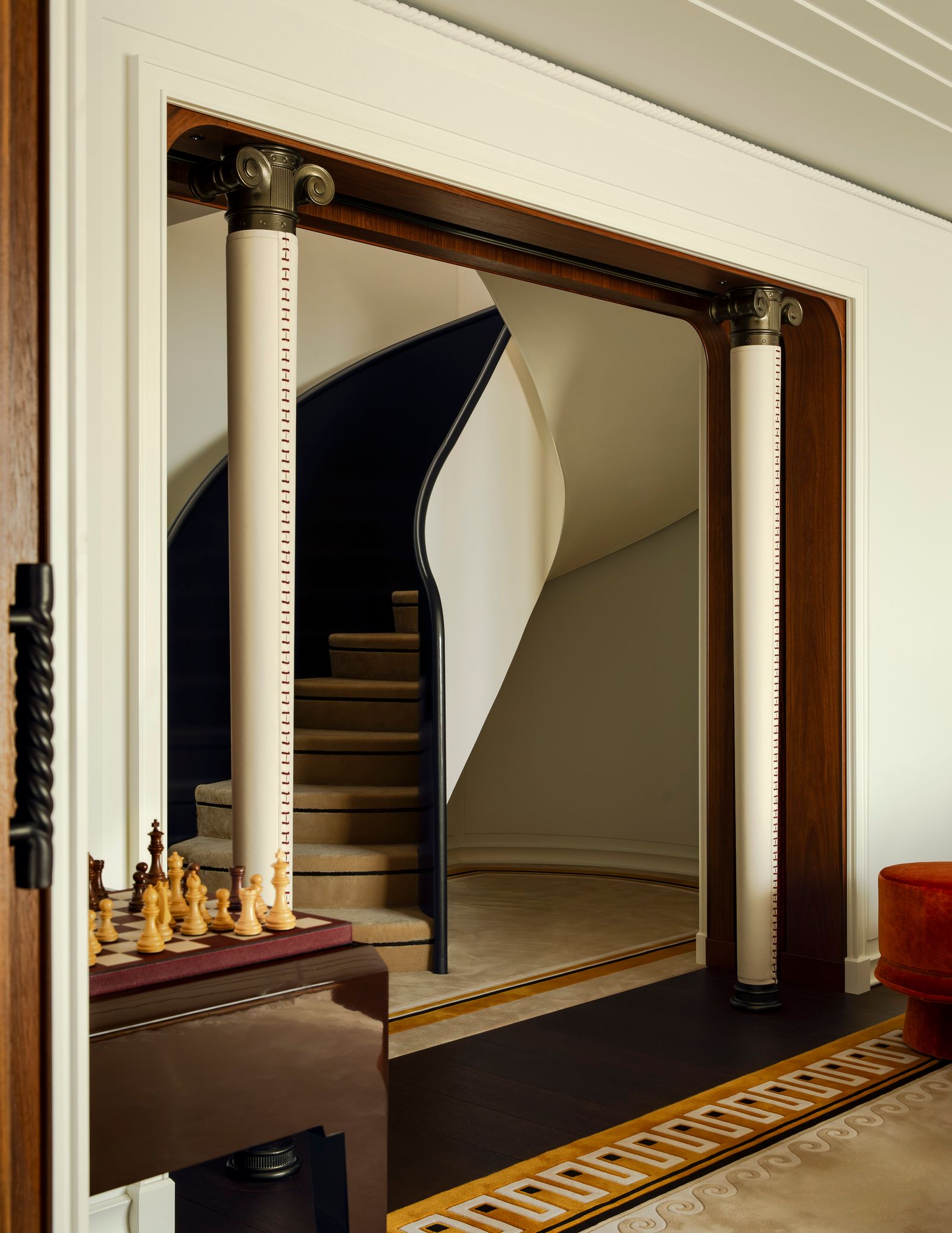 Image may contain Architecture Building House Housing Staircase Indoors Interior Design Handrail and Door