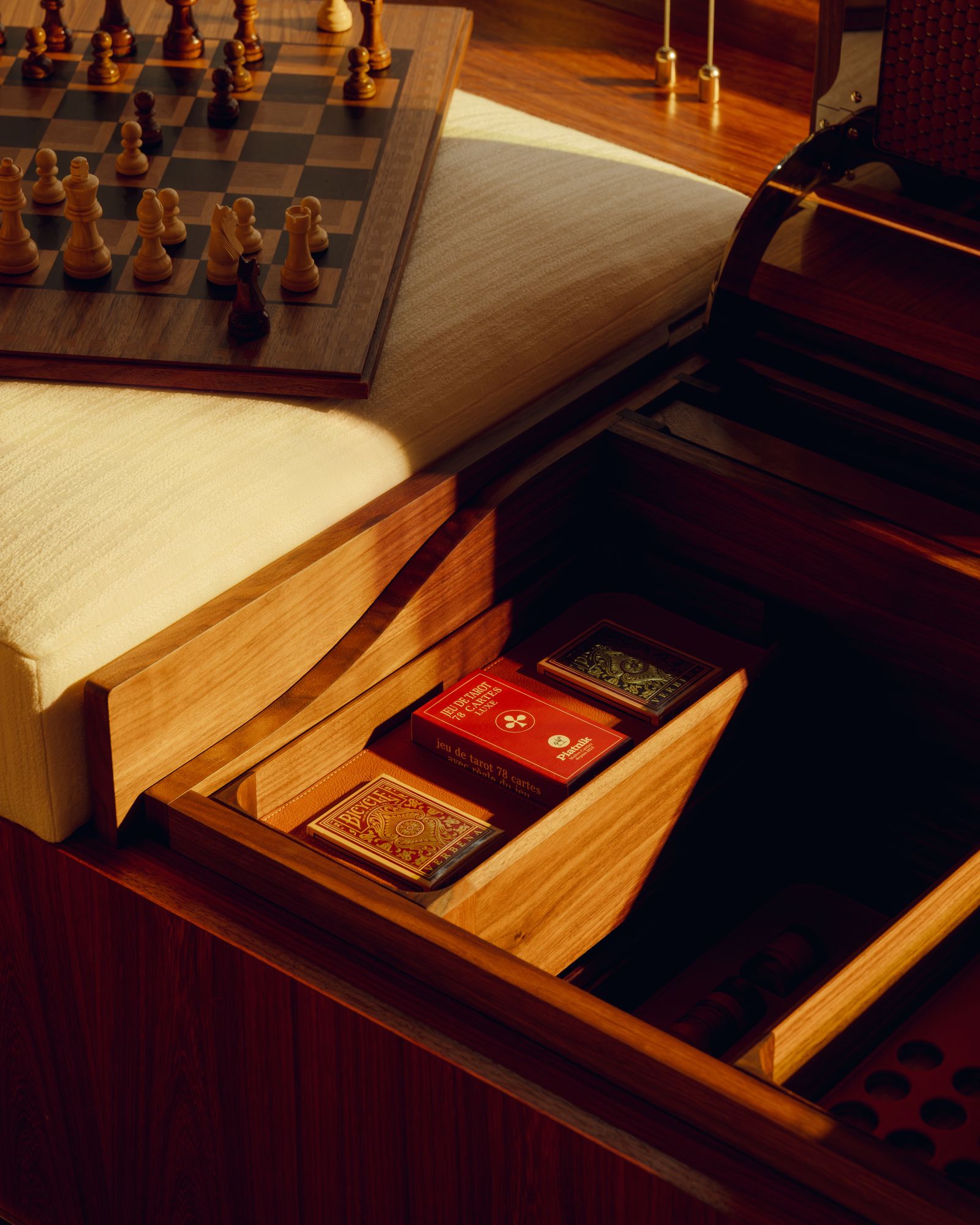 Image may contain Drawer Furniture Chess Game Wood and Cabinet