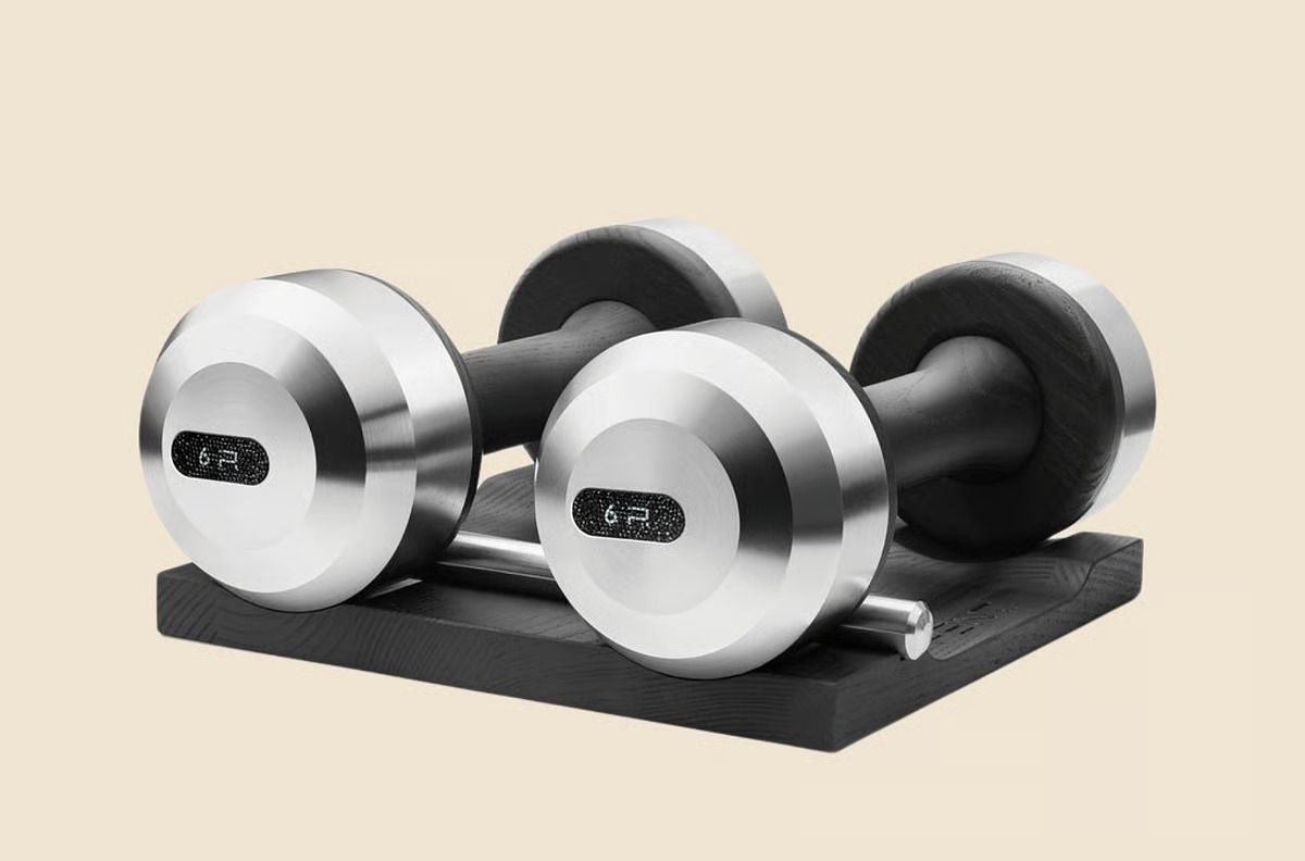 Image may contain Tape Working Out Fitness Gym Sport Gym Weights and Bicep Curls