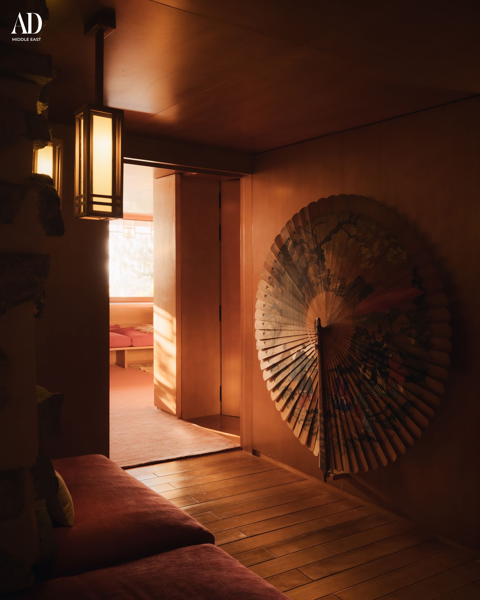 Image may contain Indoors Interior Design Lighting and Wood Panels