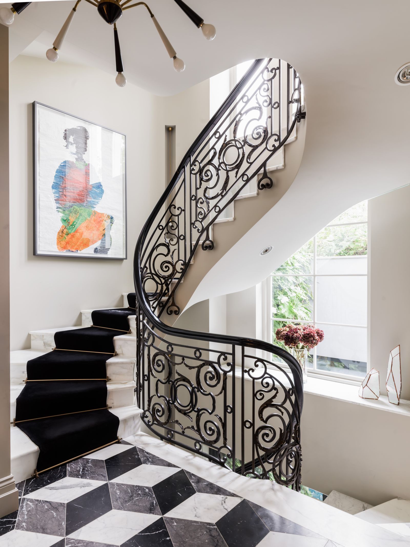 Image may contain Architecture Building Foyer Indoors Art Painting House Housing and Staircase