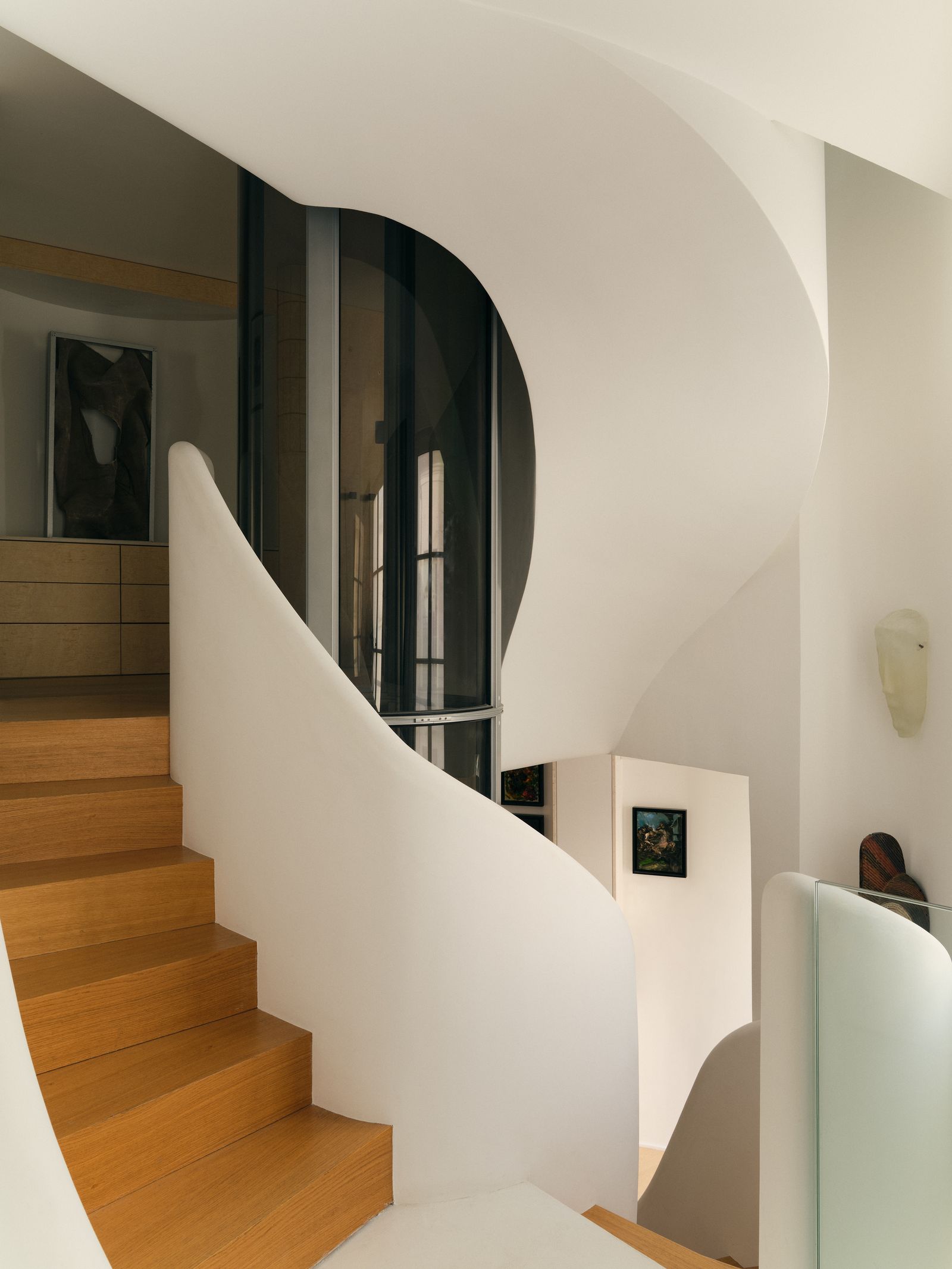 Image may contain Architecture Building House Housing Staircase Indoors Interior Design Handrail and Wood