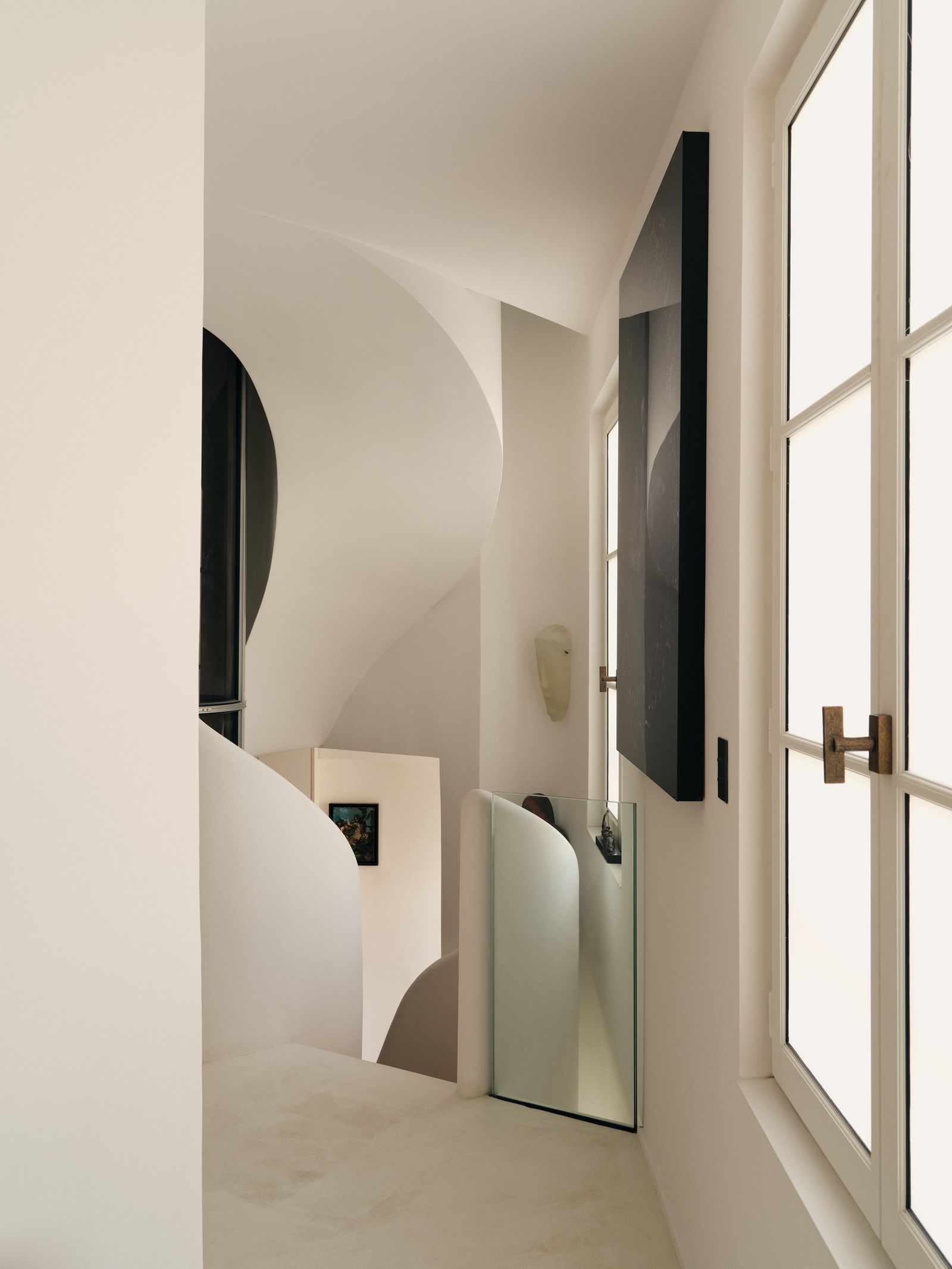 Image may contain Corner Door Indoors Interior Design Architecture Building House Housing Staircase and Art