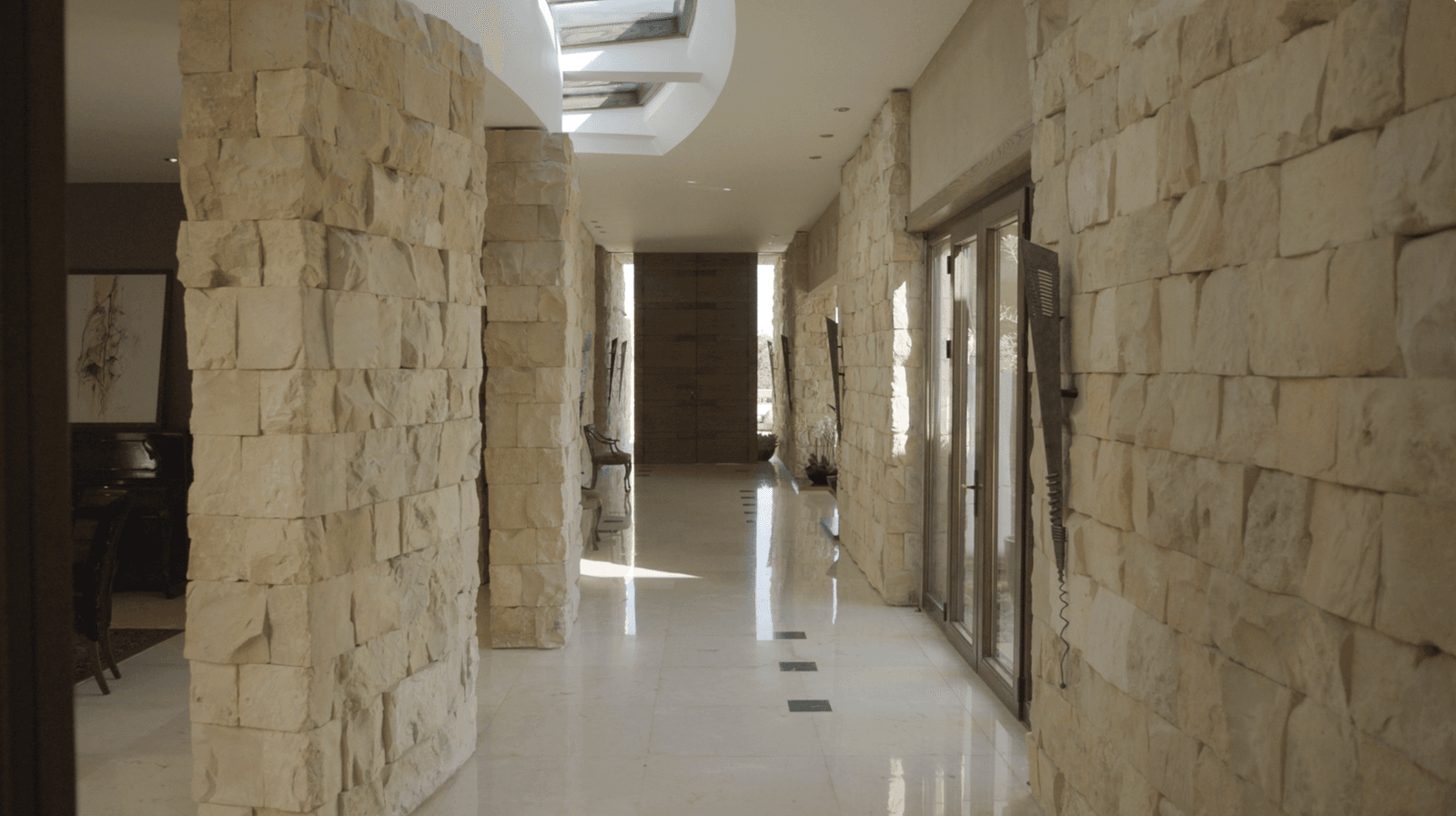 Image may contain Floor Flooring Architecture Building Corridor Indoors Path and Walkway